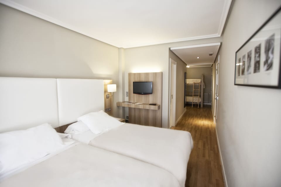 Family Room | Minibar, in-room safe, rollaway beds, free WiFi