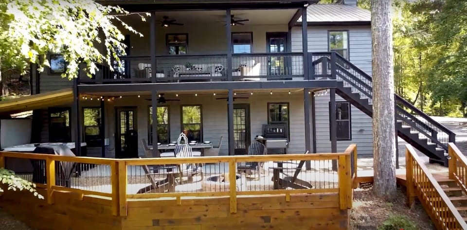 Outdoor entertaining from the back of the house soaking in the view of the creek