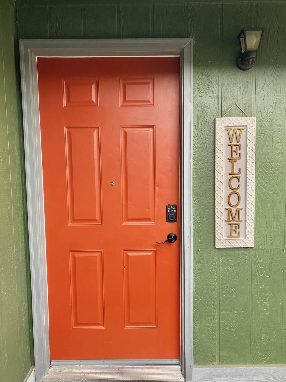 Front door located to the right when you walk up. Self check-in with keypad.