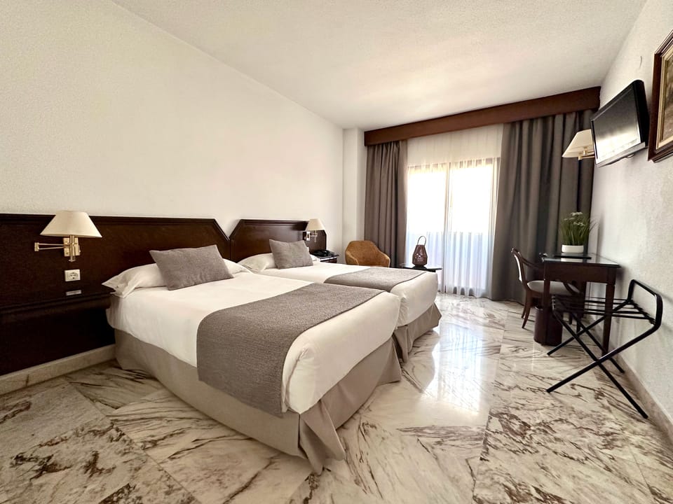 Premium bedding, in-room safe, desk, laptop workspace