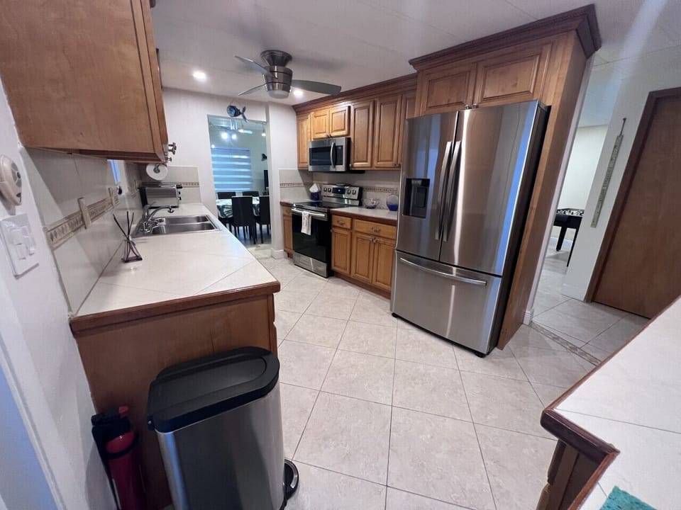 Large kitchen with stainless steel appliances and plenty of storage