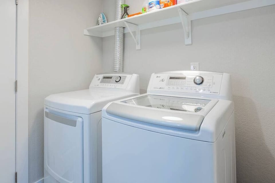 Practical and efficient laundry area, designed to simplify your laundering tasks and keep your clothes fresh and clean.