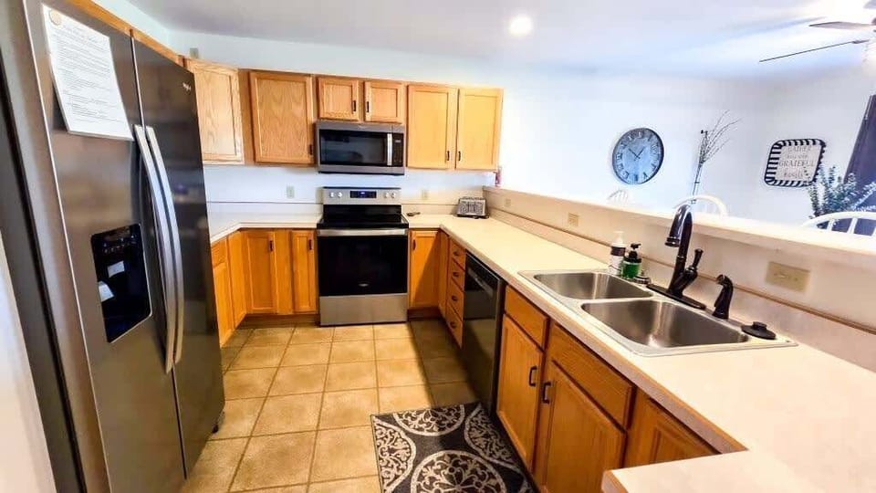 New appliances and large kitchen for cooking meals for anyone