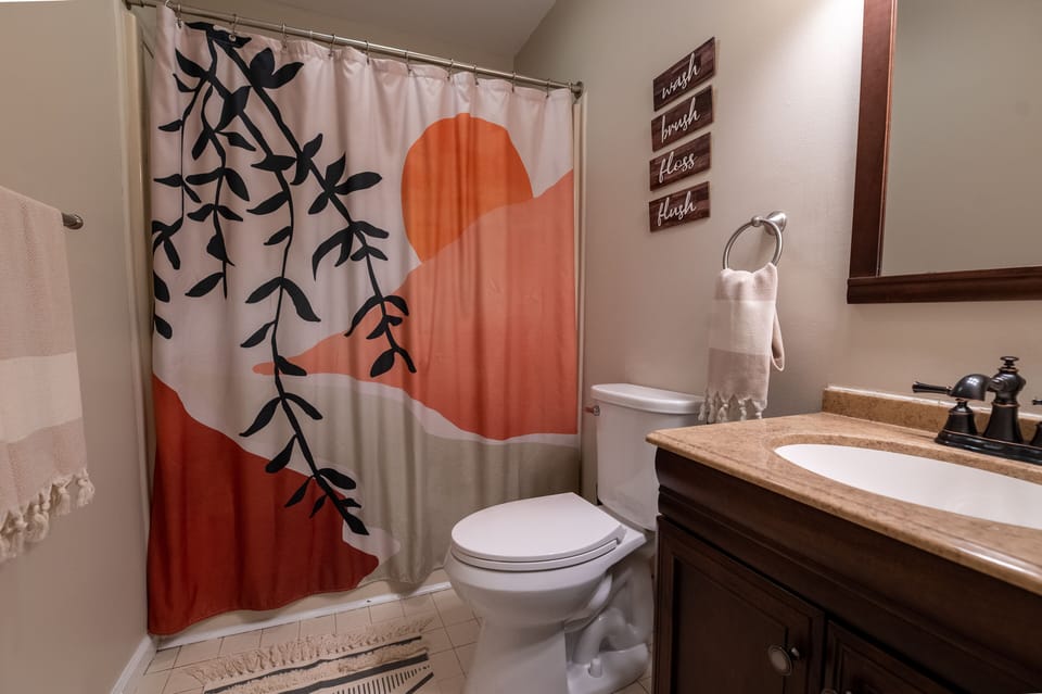 Main floor full bathroom with tub