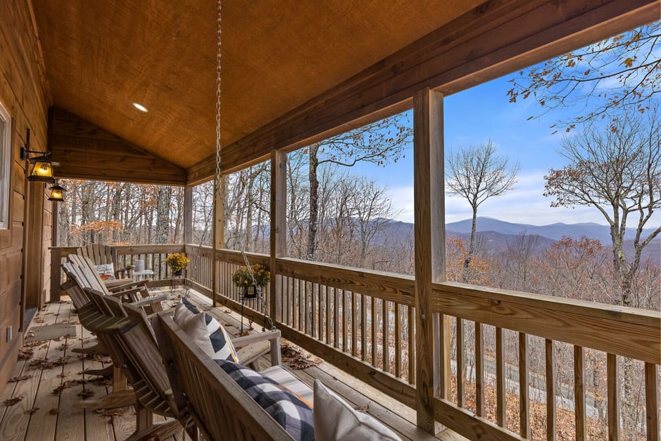 Porch Swing and Adirondack-Style Seating on the Covered Deck With Long-Range Mountain Views