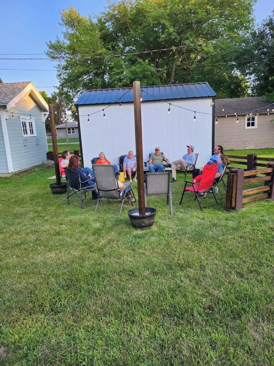 Fire pit &  garden area with string lights for enjoying the moonlit evenings.