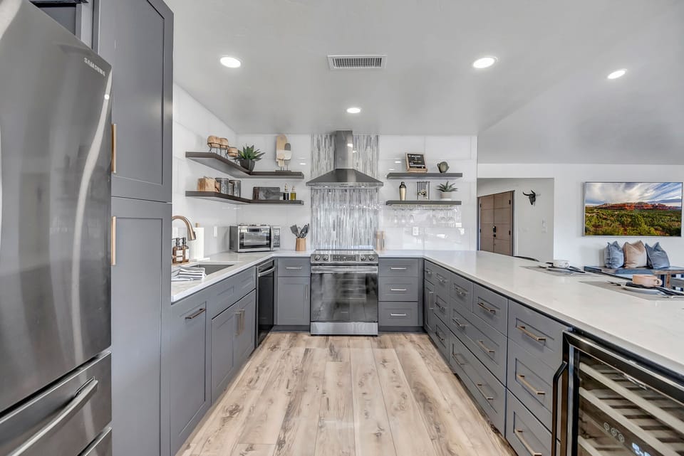 Fully Equipped Kitchen with Black Stainless Steel Appliances