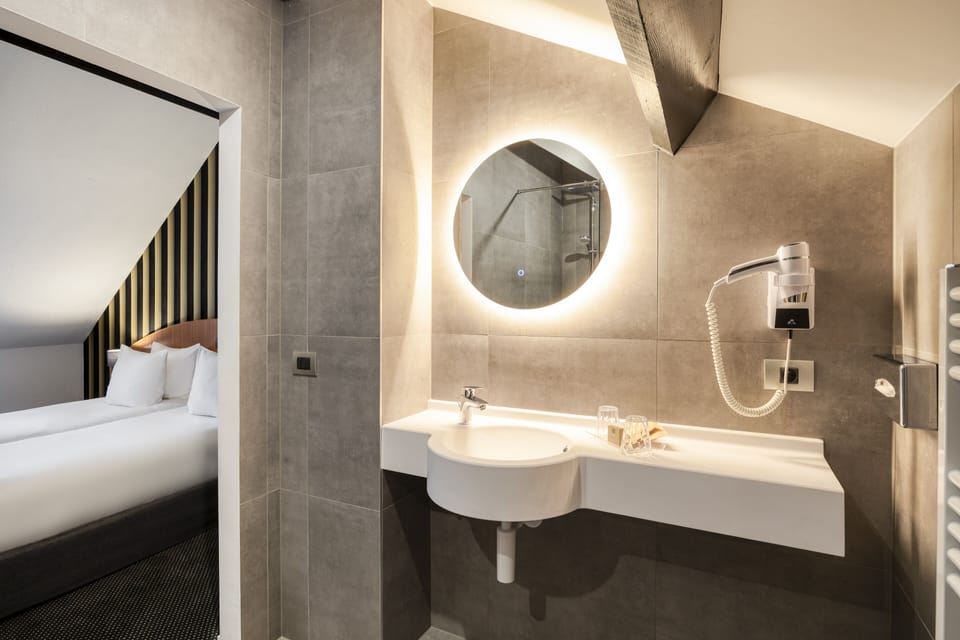 Shower, eco-friendly toiletries, hair dryer, bathrobes