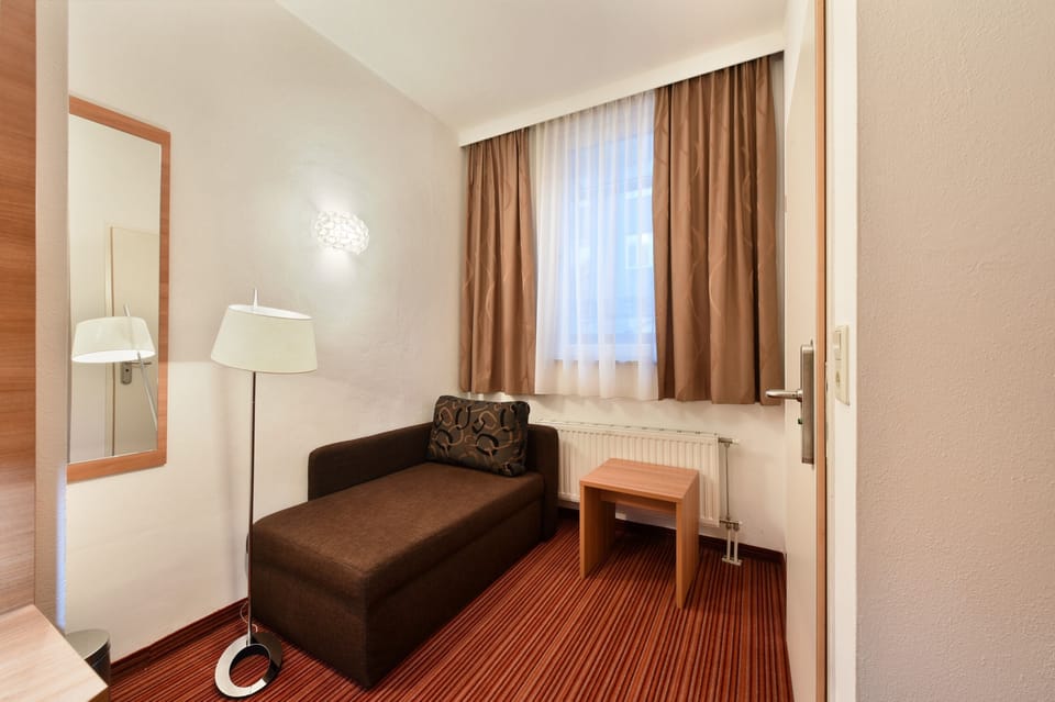 Standard Double Room | Living area | 0-cm TV with cable channels