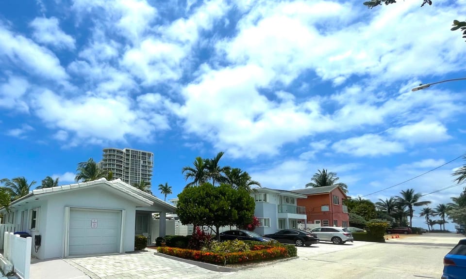 Welcome to FL beach living! Just feet from the sunny shores of Hollywood.