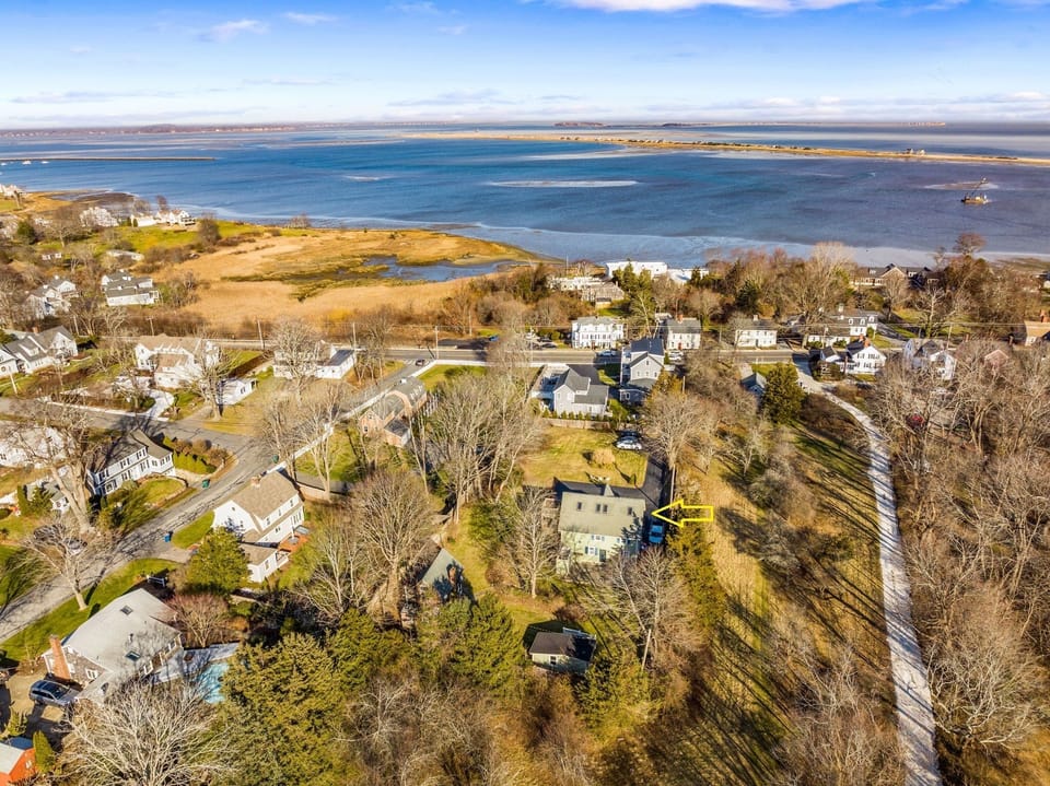 Home is perched on a hill across the street from Plymouth Harbor