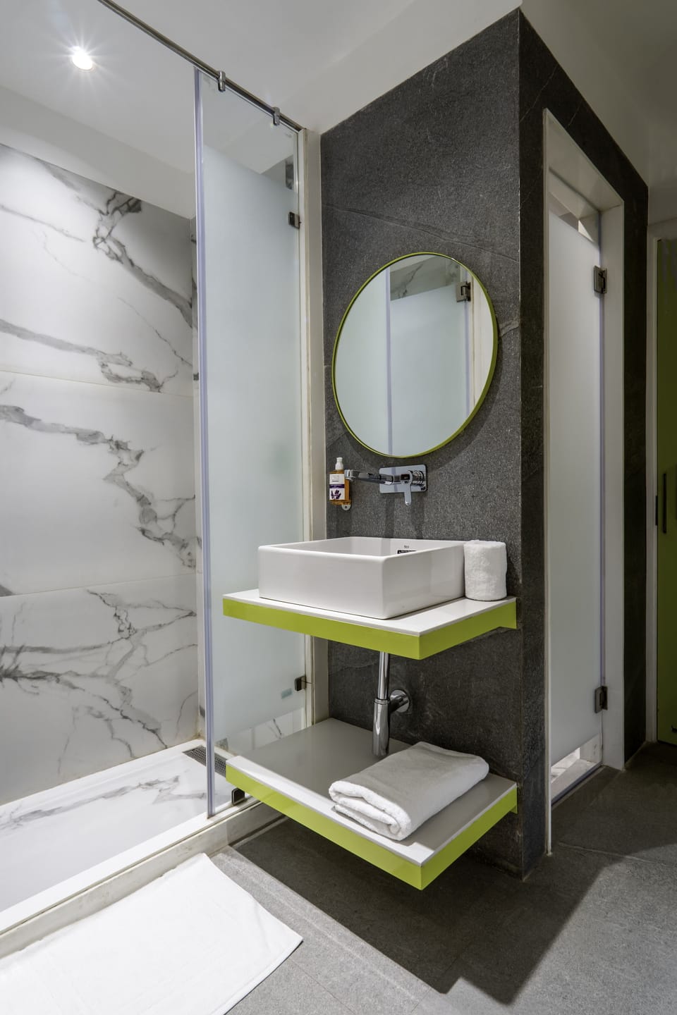 Shower, hydromassage showerhead, designer toiletries, hair dryer