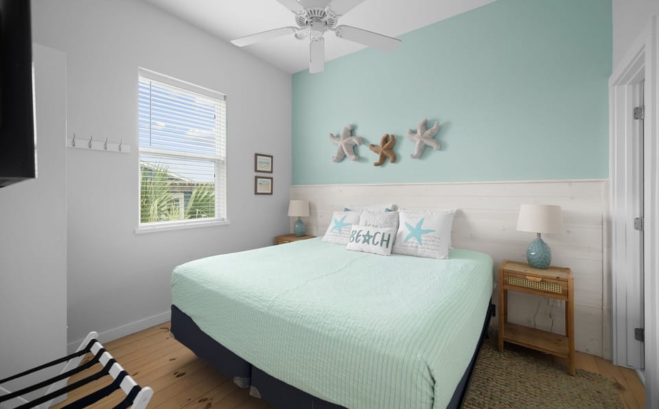 Bedroom — King Bed with Mint Bedding, Starfish Decor & BEACH Pillow