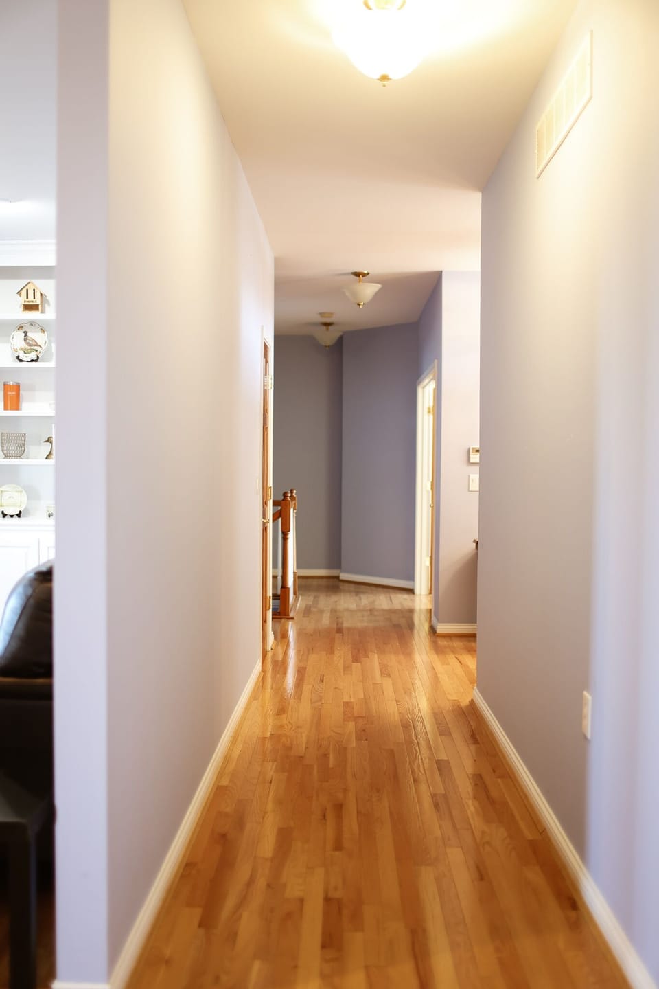 This hallway is on the main floor. Across from the entry way is the downstairs. 