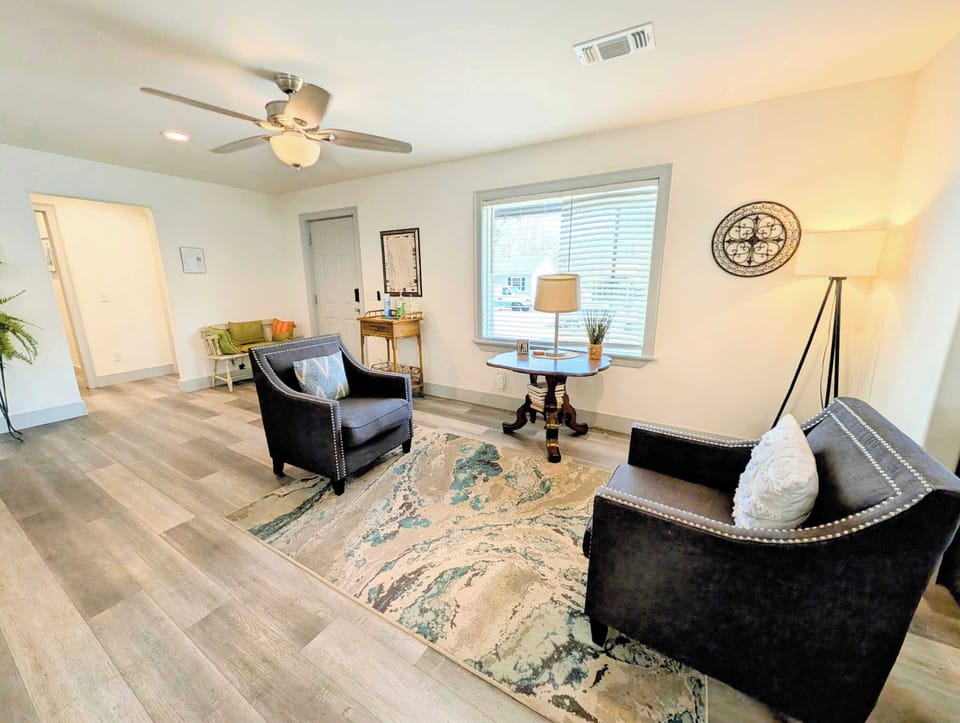 Comfortable seating in a warmly lit living space.