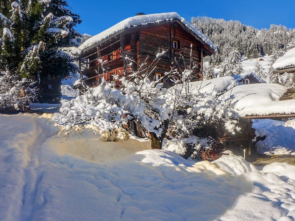 View of the snow-covered chalet.