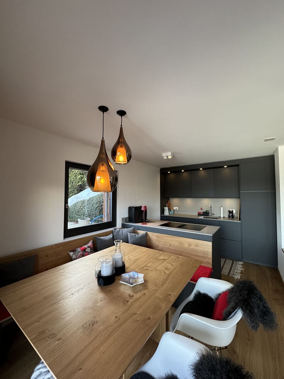 The freshly renovated kitchen opens onto a beautiful dining room, creating an inviting space.