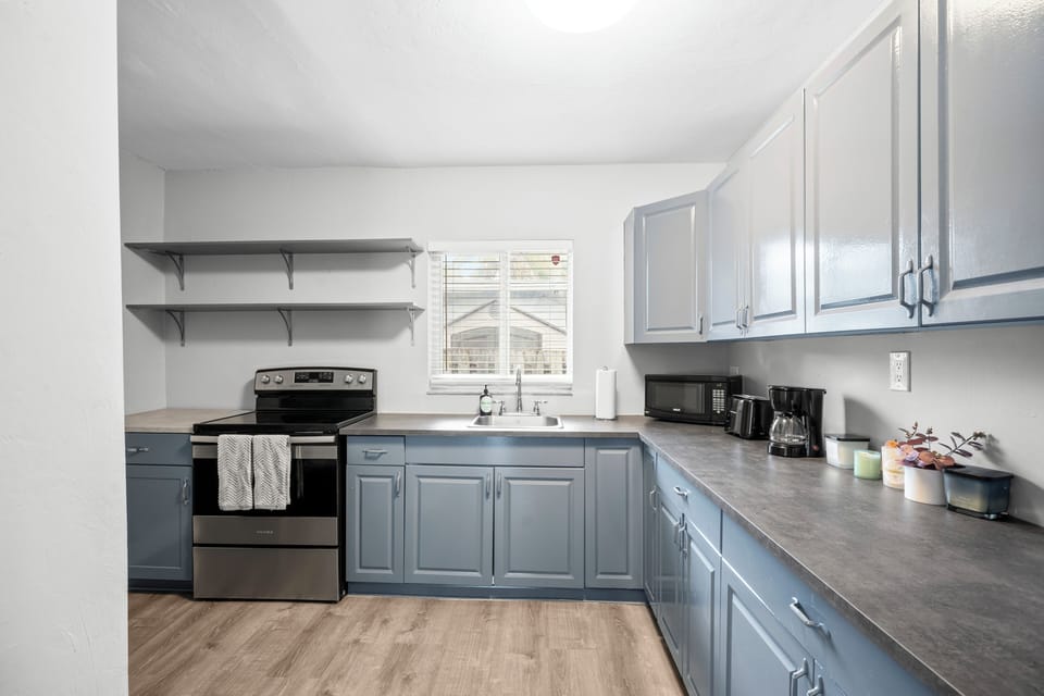 Premium 2-Bedroom Family Suite w/ Kitchen & Sofa Bed | Private kitchen | Coffee/tea maker, electric kettle
