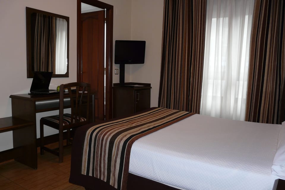 Premium bedding, down comforters, individually decorated, desk