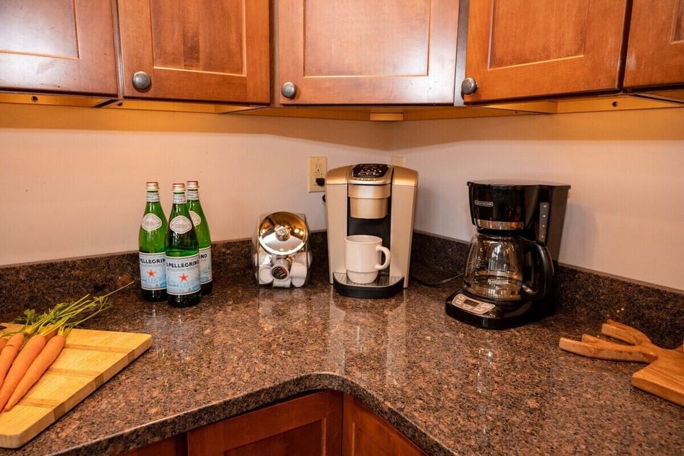 Coffee bar in the kitchen with both pot coffee maker and Keurig machine