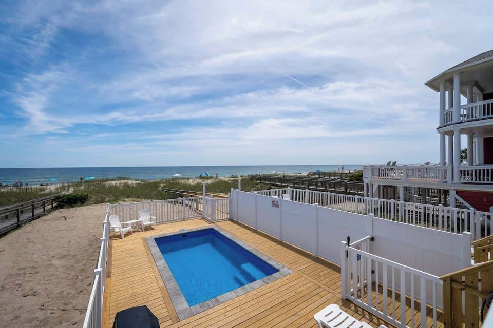 Enjoy the best of coastal living with a private pool and direct beach access.