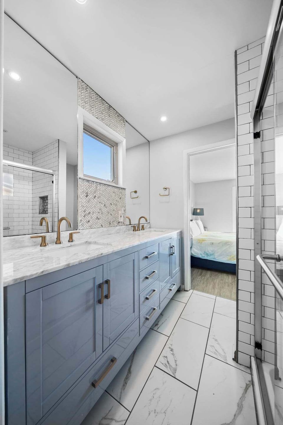 A shared Jack and Jill bathroom conveniently connects the two second-level bedrooms.