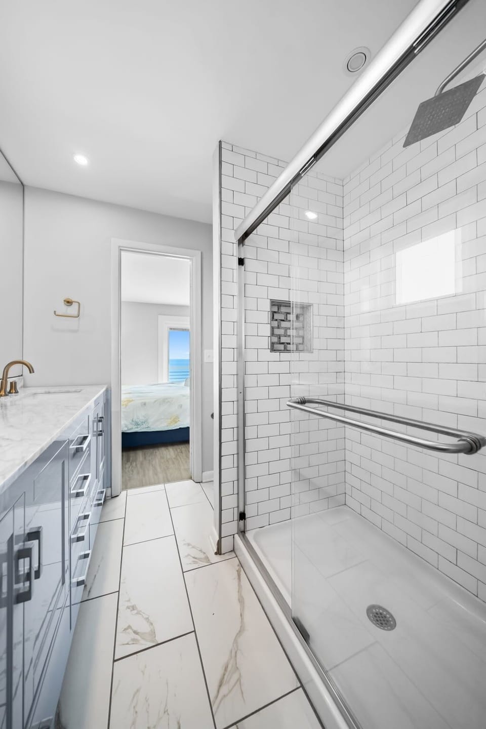 Shared Jack and Jill bathroom offers easy access for guests staying on the second level.