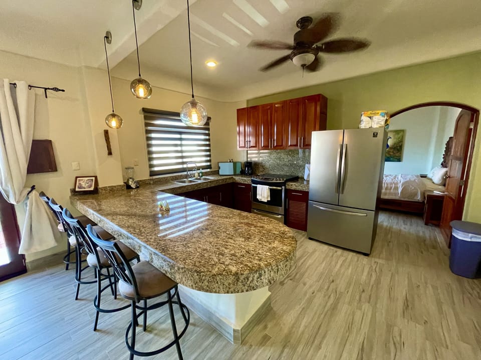 Fully equipped kitchen with new appliances.
