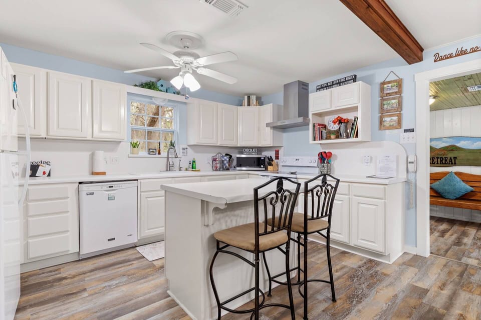 Experience the recent updates at River Road Retreat, where thoughtful improvements such as new floors and a vent hood enhance your stay.