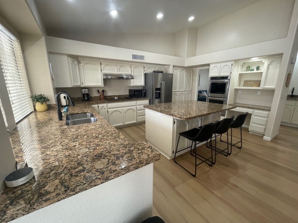 Kitchen with eat in island.