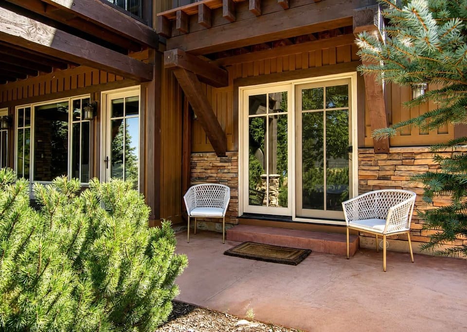 Master suite features direct access to a private patio for added relaxation.