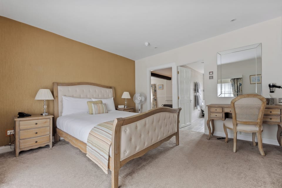 Premium bedding, pillowtop beds, desk, laptop workspace
