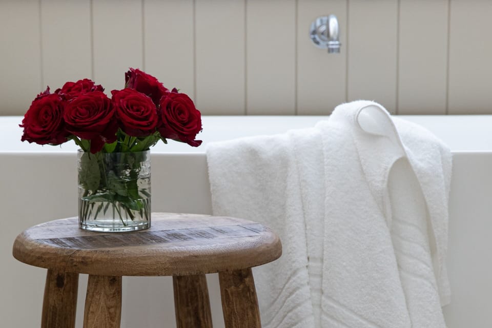 Lodge Bath Suite | Bathroom | Designer toiletries, hair dryer, bathrobes, slippers