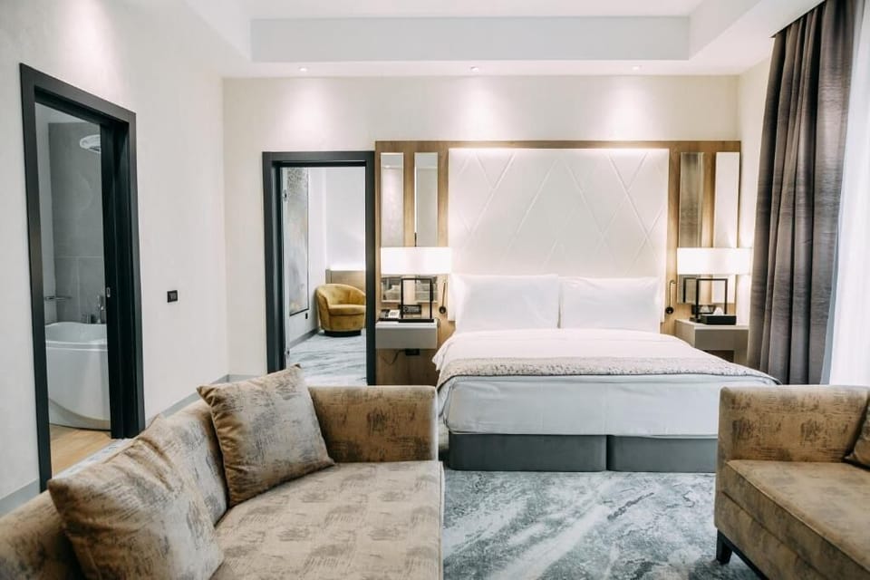 Family Suite | Living area | TV