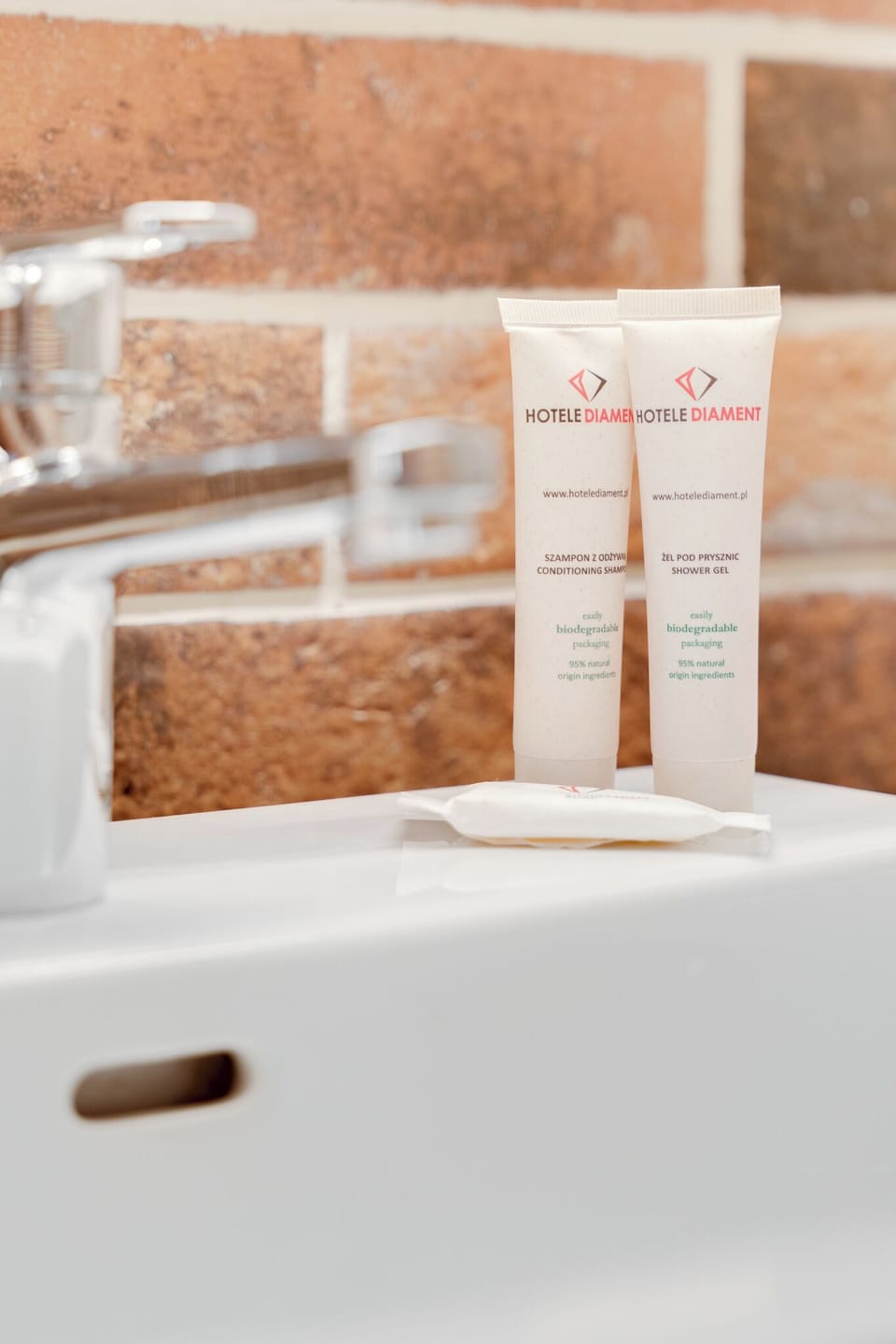 Designer toiletries, hair dryer, towels, soap