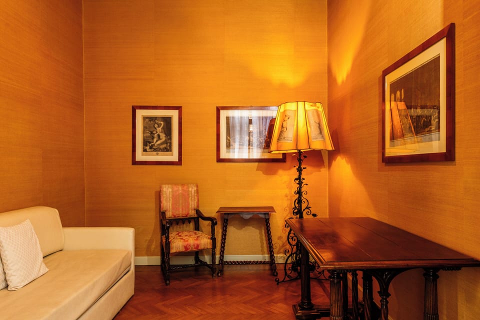 Royal Studio Suite | Living area | 40-inch flat-screen TV with satellite channels, TV