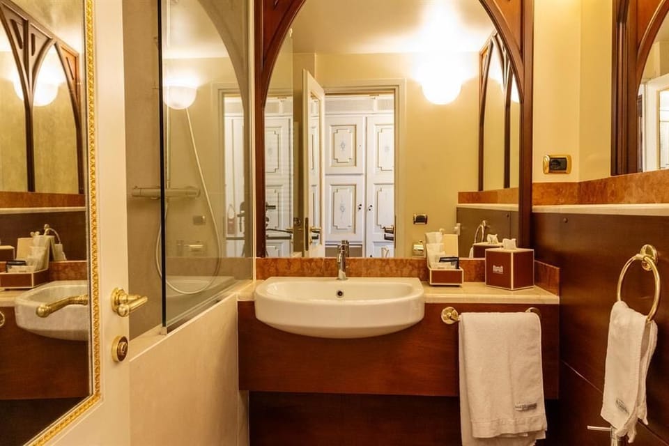 Deluxe Room, Multiple Beds | Bathroom | Free toiletries, hair dryer, bidet, towels