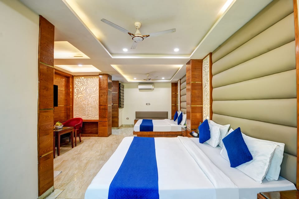Family Room | Premium bedding, down comforters, desk, free WiFi