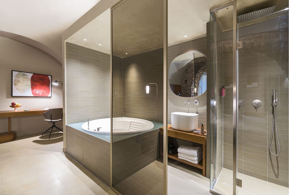 Jetted tub, rainfall showerhead, free toiletries, hair dryer