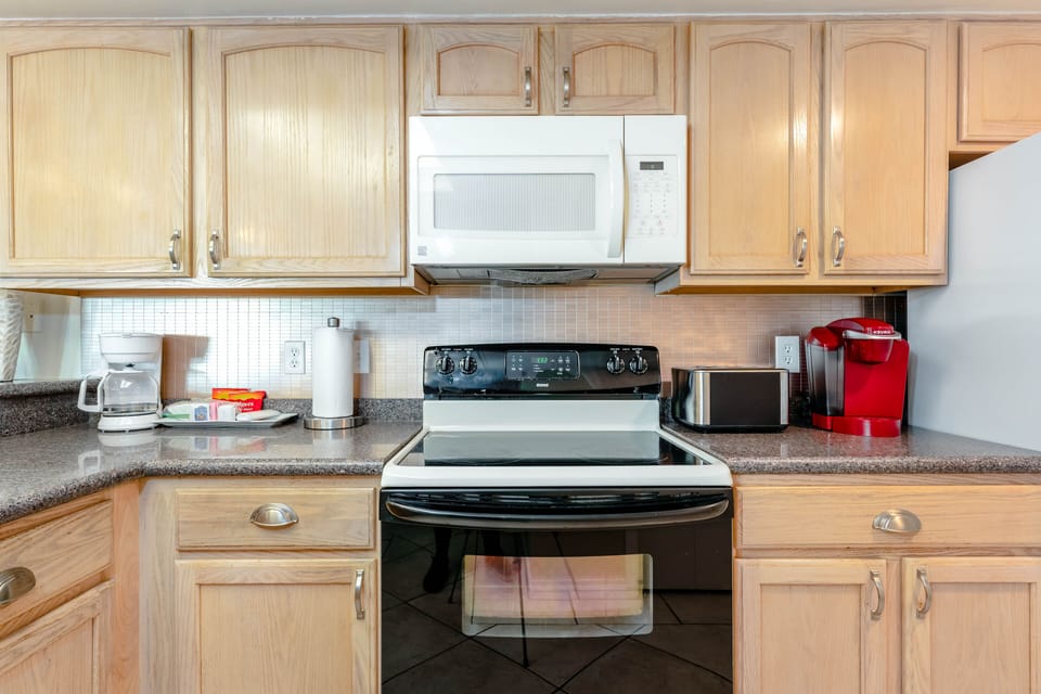 We've packed our lovely little kitchen with full-size appliances so you can get the most out of the space.