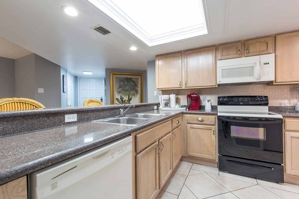 We've equipped our well appointed kitchen with granite countertops that are so easy to work on, plus add a touch of personality to our cozy kitchen.