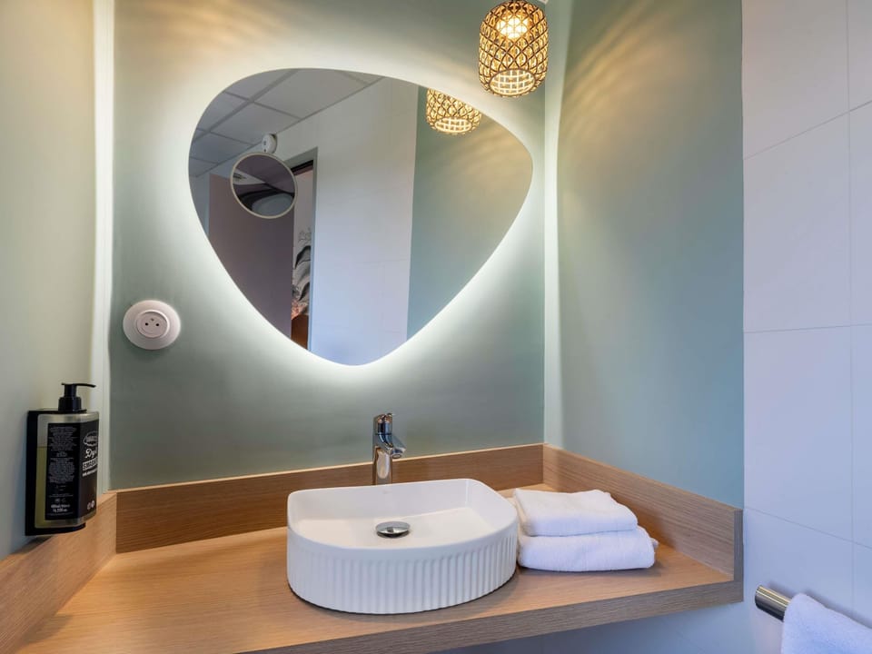 Desk, blackout drapes, soundproofing, iron/ironing board