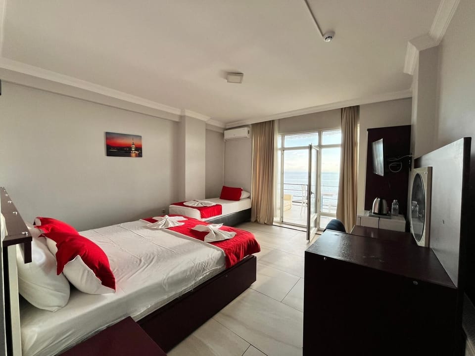 Deluxe Room, Sea View | Egyptian cotton sheets, premium bedding, down comforters, minibar
