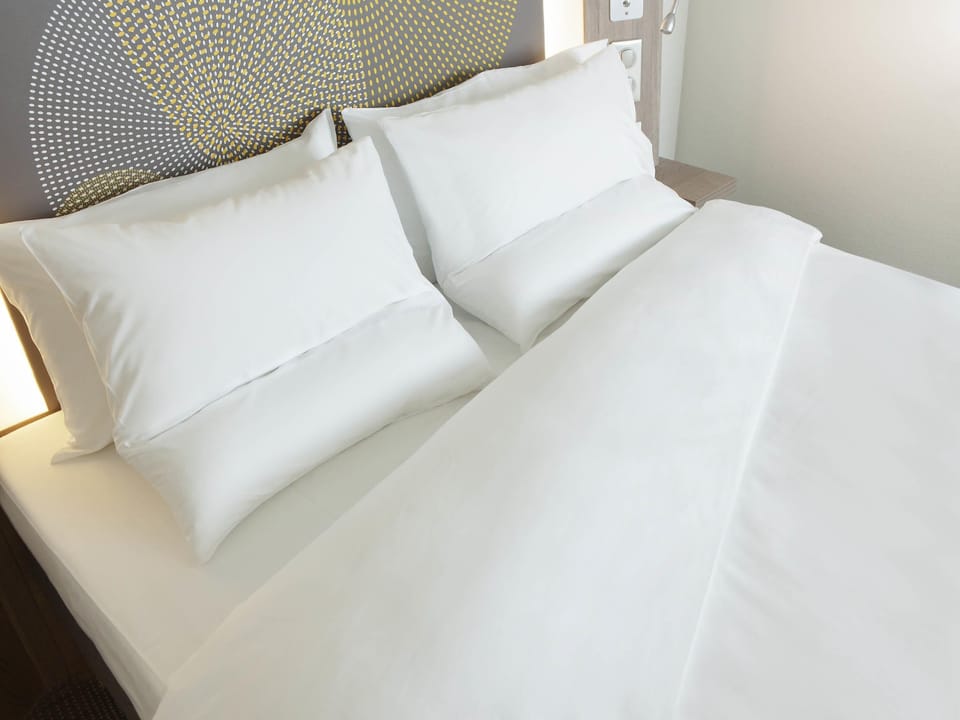 Hypo-allergenic bedding available, memory foam beds, in-room safe, desk