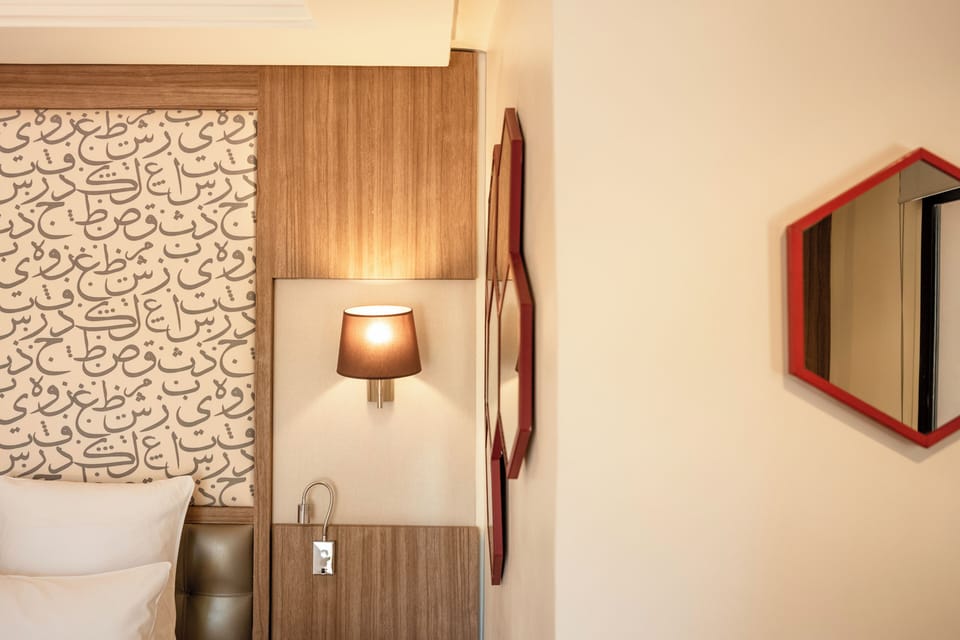 Deluxe Room | Premium bedding, in-room safe, laptop workspace, blackout drapes