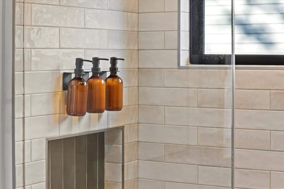 Shampoo, conditioner & body wash provided.