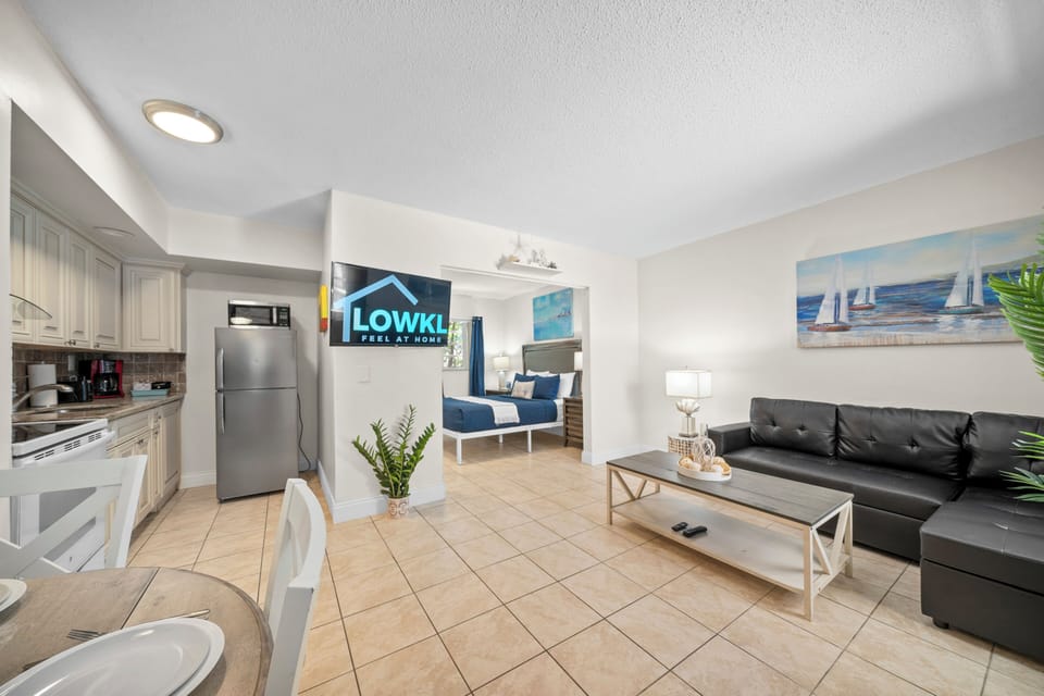 Deluxe 1-Bedroom Queen w/ Kitchen & Sofa Bed | Living area | 42-inch Smart TV with digital channels, TV, Netflix