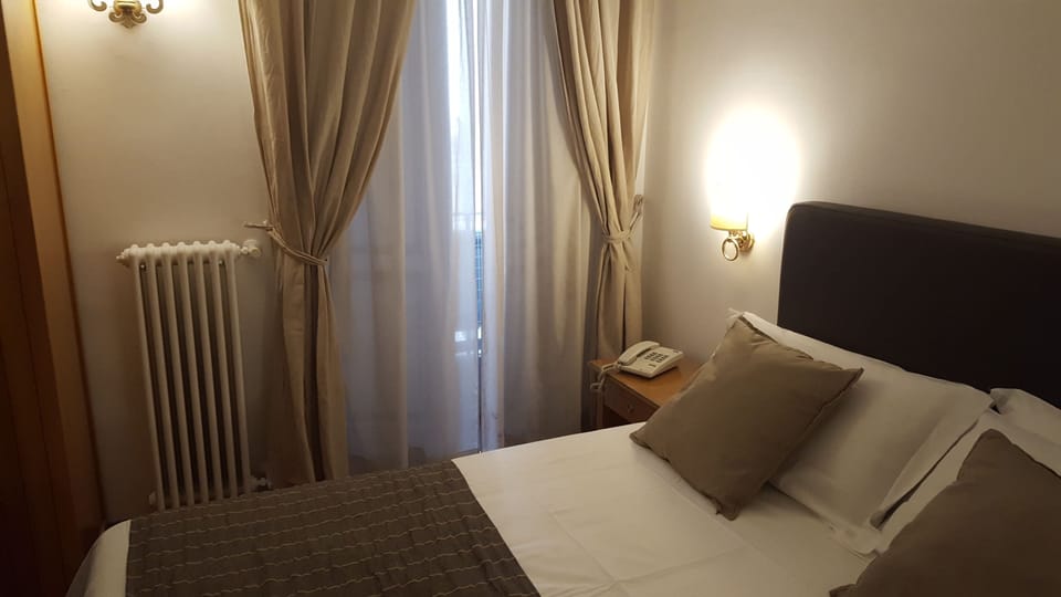 Quadruple Room | Hypo-allergenic bedding, minibar, in-room safe, desk