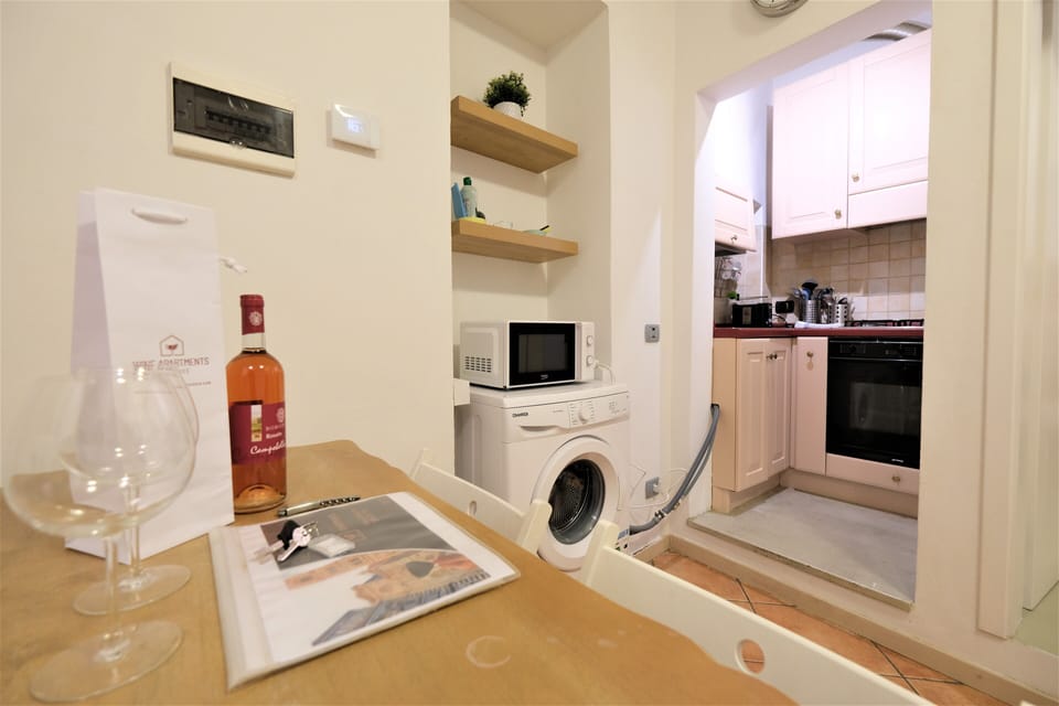 City Apartment | Living area | 100-inch Smart TV with digital channels, TV