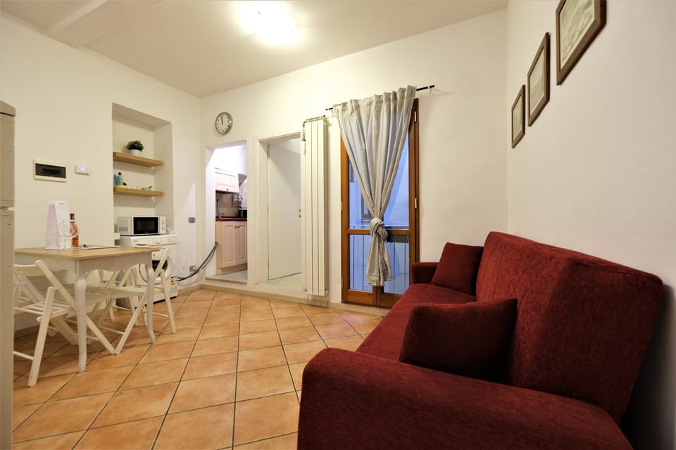 City Apartment | Living area | 100-inch Smart TV with digital channels, TV